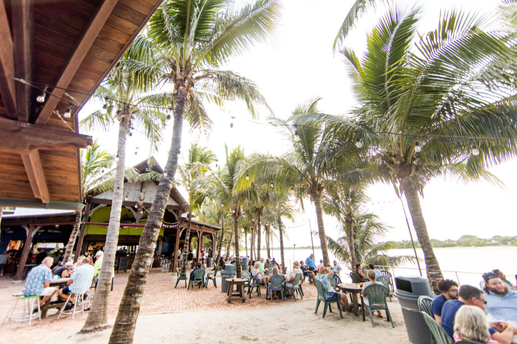 Wide photo of the inside of the Square Grouper Tiki Bar on the Fort Pierce Inlet